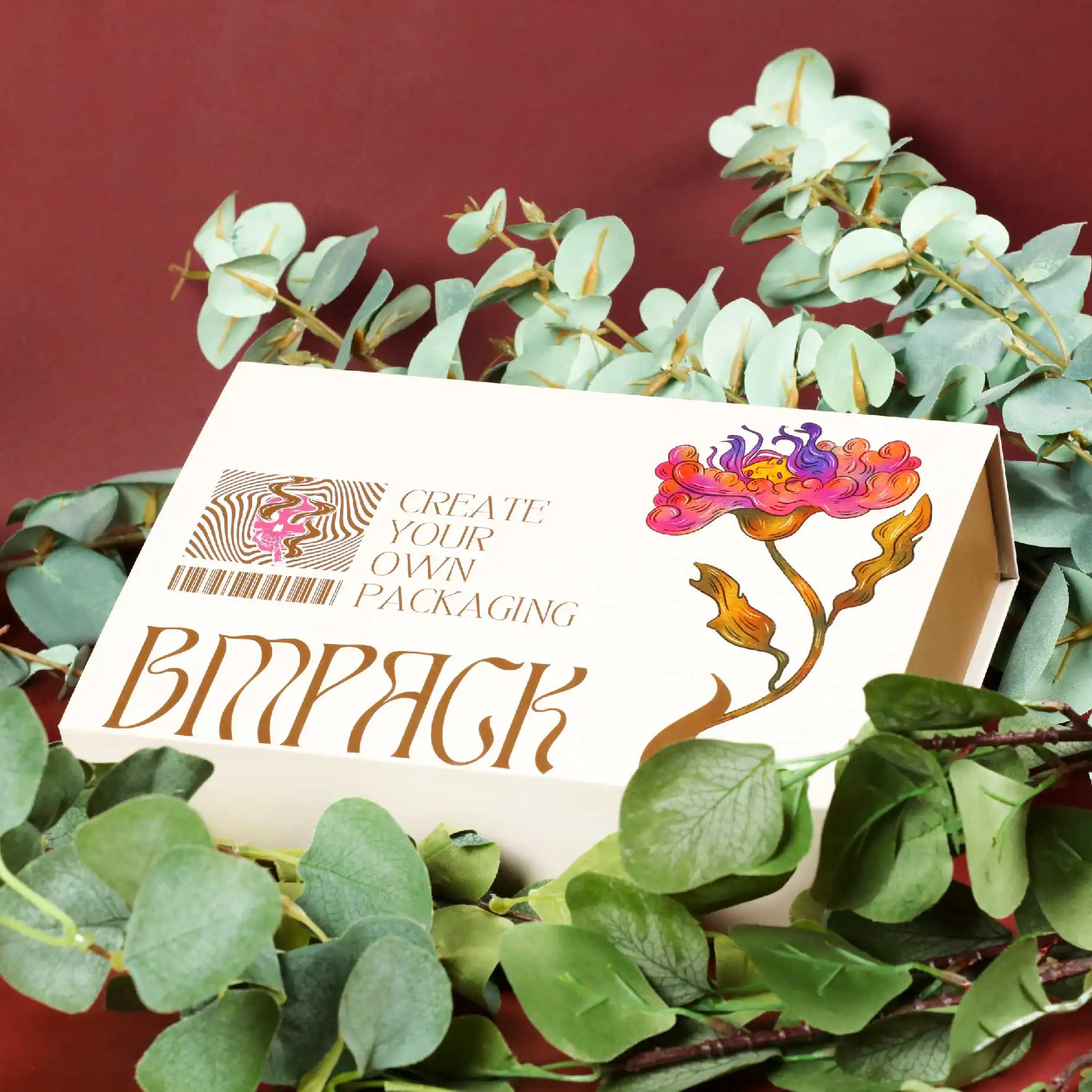 在深紅色的背景下，在樹枝上擺放了一個米白色的磁石書型硬盒，盒面印有"BM Pack"和"Create your own Packaging"字眼加上淺紅色的花朵圖案作點綴。